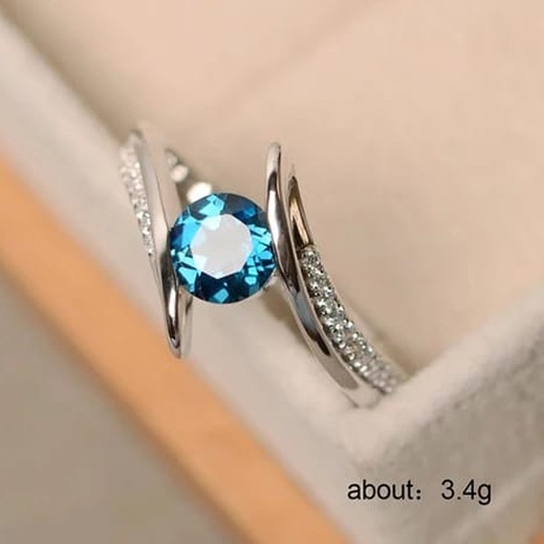 SIGNATURE COLLECTIONS Teal Blue Solitaire Ring SGR012